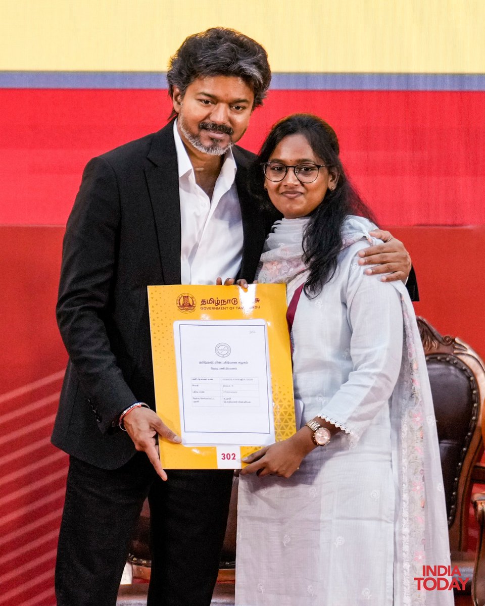 IndiaToday's tweet photo. #InPics | Tamil Nadu Chief Minister C Joseph Vijay presents appointment orders to candidates during a function organised by the Energy Department, at Kalaivanar Arangam, in Chennai. The appointment orders were distributed to 401 candidates, including 383 Assistant Engineers (Electrical) and 18 Assistant Accounts Officers selected through the Tamil Nadu Public Service Commission.

#CJosephVijay #JosephVijay #TamilNadu #TamilNaduCM #Chennai #KalaivanarArangam #EnergyDepartment #AssistantEngineers #ElectricalEngineers #AppointmentOrders #TamilNaduGovernment #IndiaToday