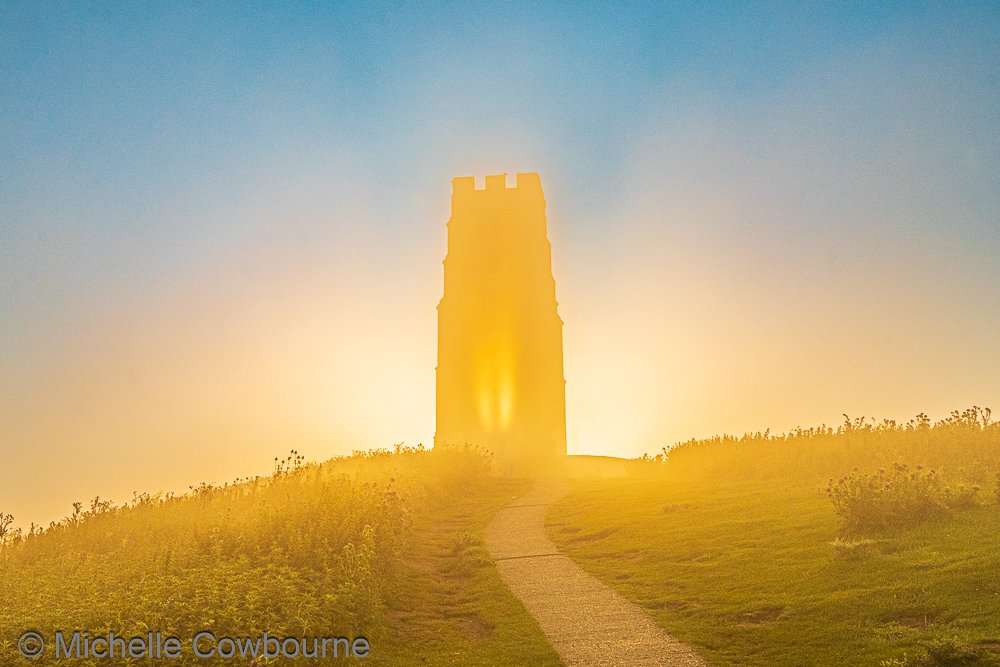 Glastomichelle's tweet photo. Mysterious and magical sunrise on Glastonbury Tor this morning. https://t.co/X2lfaM5h69