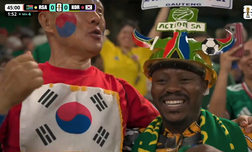 TouchlineX's tweet photo. 📸 - A South Korea and South Africa fan celebrating together. https://t.co/A8GK7qgAVc