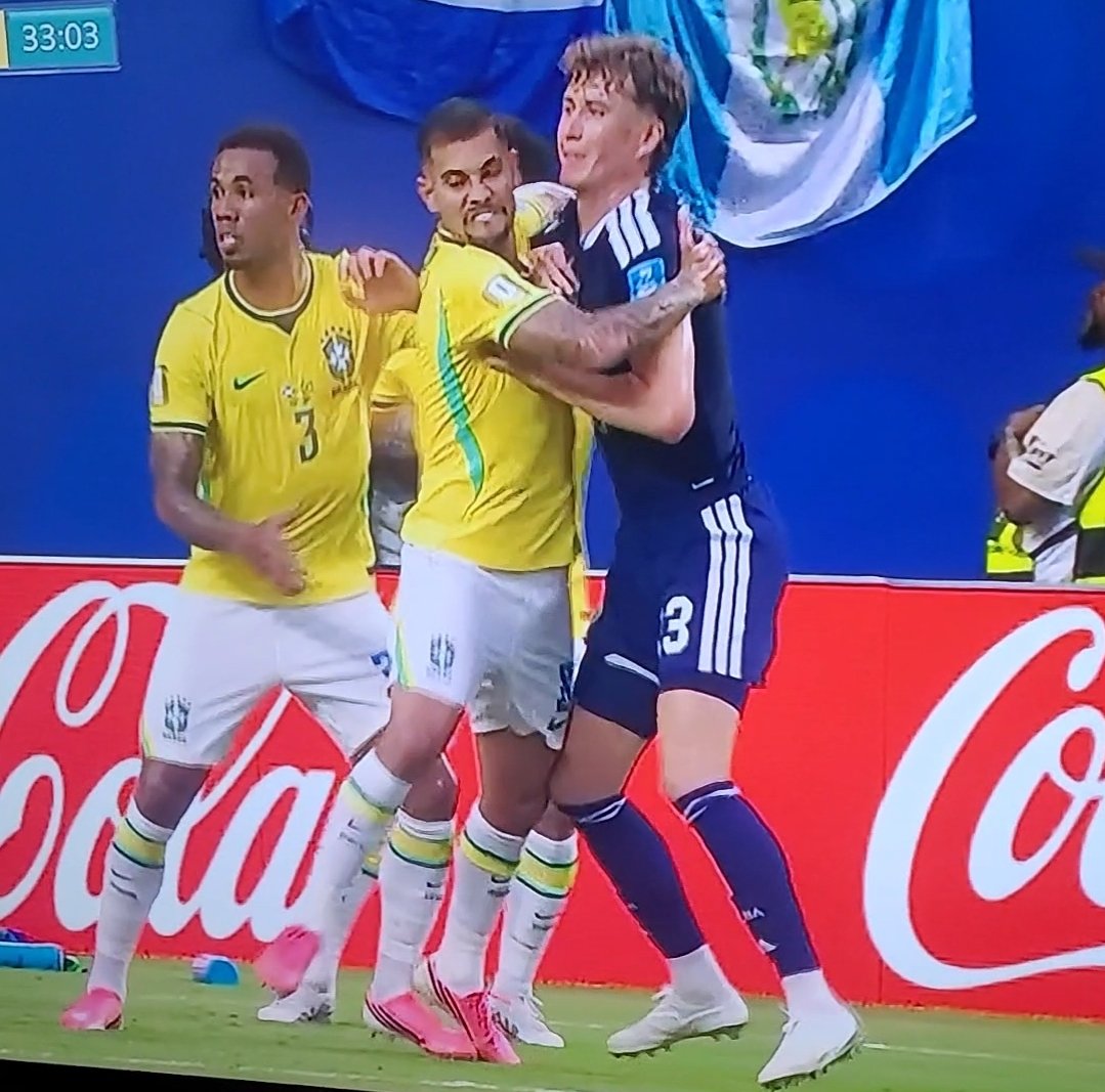 GavinGmart's tweet photo. You can wrap your hands around an attacker while the ref looks directly on and claim you're being fouled. Welcome to the f***ed up modern game #WorldCup2026 #SCOBRA https://t.co/hVua0cGYbH