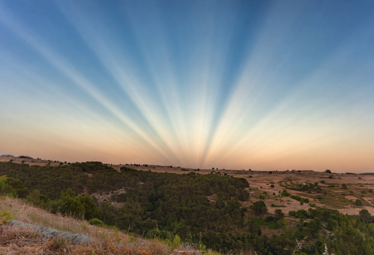 nasa_apodx's tweet photo. Sunset in the west,
yet light is playing tricks in the east!
Just when you thought you’ve seen it all,
even clouds can throw a shadow party! 🌤️✨
#AnticrepuscularRays #NatureMagic https://t.co/GW7okZGrxb