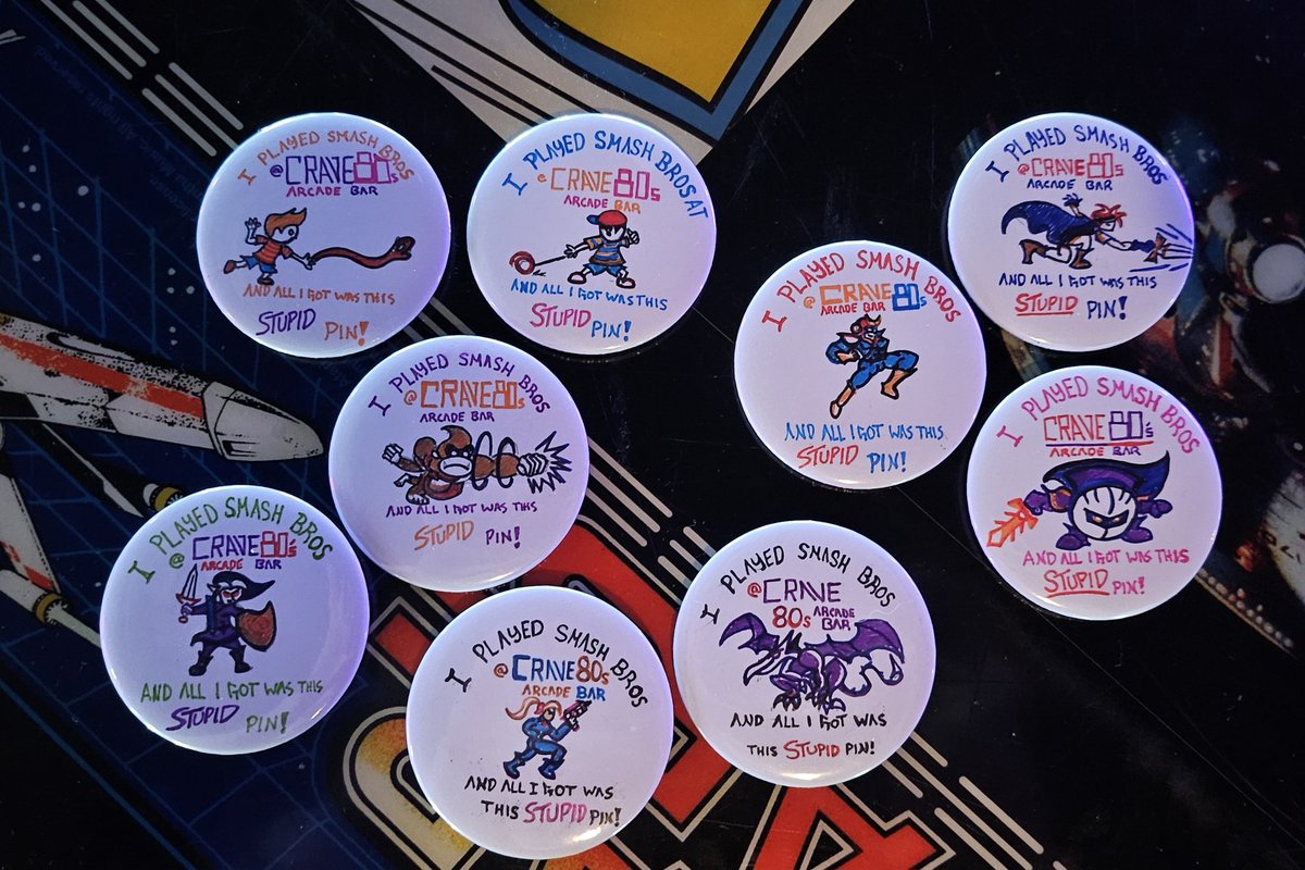 hypertane's tweet photo. Made a bunch of pins for Street Fighter and Smash Bros tournaments at the bar https://t.co/FsqAAjTJw4