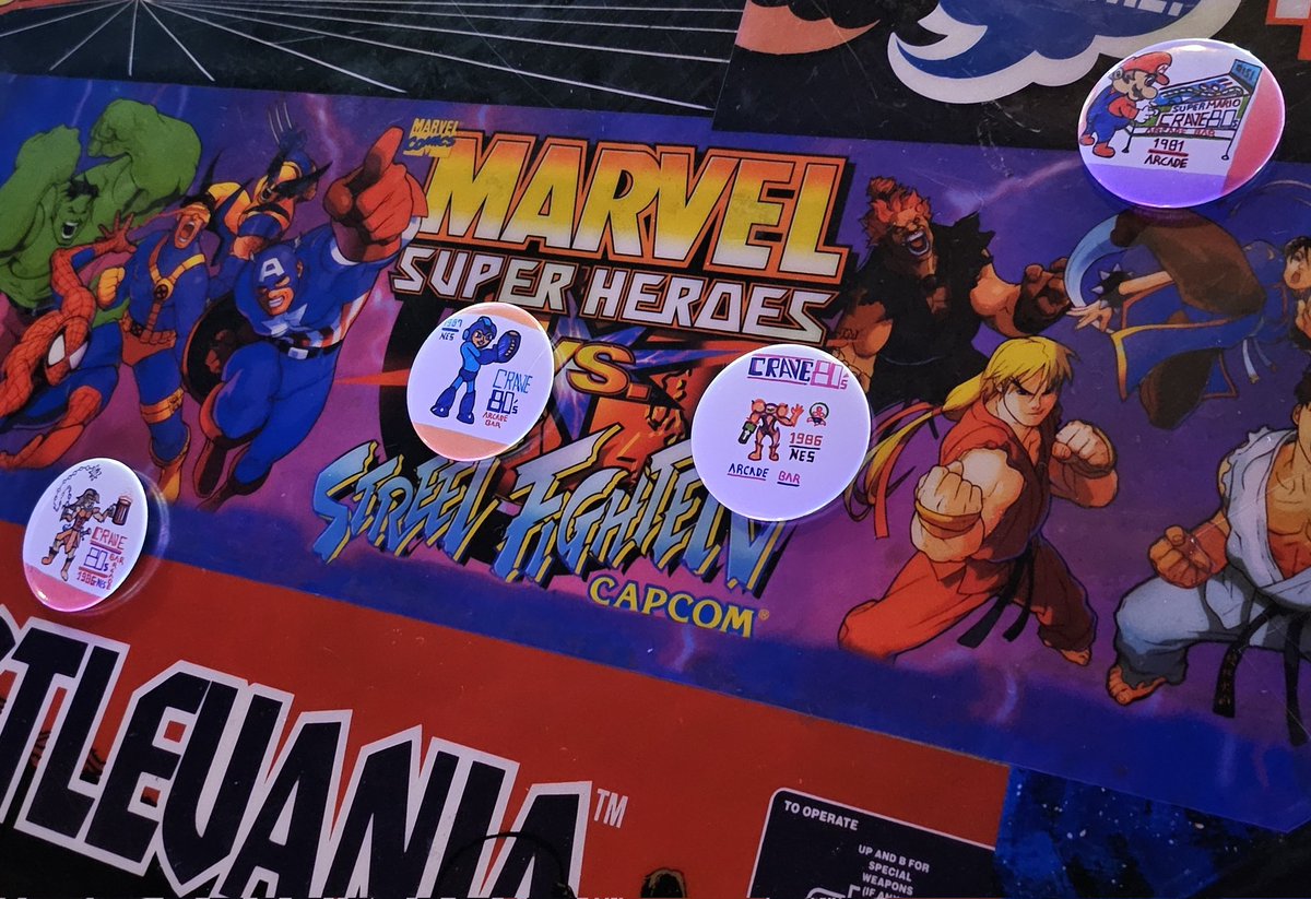 hypertane's tweet photo. Made a bunch of pins for Street Fighter and Smash Bros tournaments at the bar https://t.co/FsqAAjTJw4