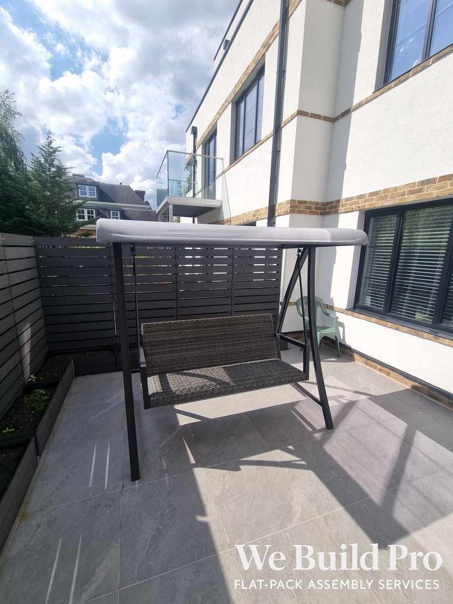 we_build_pro's tweet photo. Garden furniture done — dark grey dining table and six rattan chairs, plus a rattan swing seat with canopy.

We Build. So you don't have to.

Need help with yours? DM, call, or WhatsApp 07387 113435 for a free quote.

#WeBuildPro #FlatpackAssembly  #GardenFurnitureAssembly https://t.co/e90dMWqE22