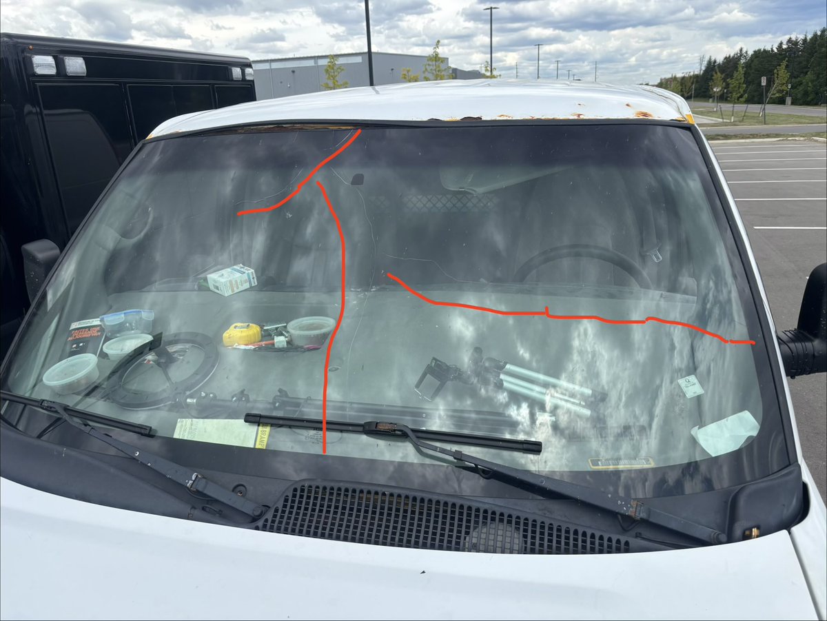 HRPSCMV's tweet photo. This van was stopped in Oakville yesterday. 🧐
Middle “seat” passenger found to be sitting on a camp chair. All 3 occupants no seatbelts.
Cracked windshield, level 3 power steering leak, rotted rocker panels, overweight, improper permit, no parking brake. #OOS/Plates/Charges https://t.co/oXCwBacK0I