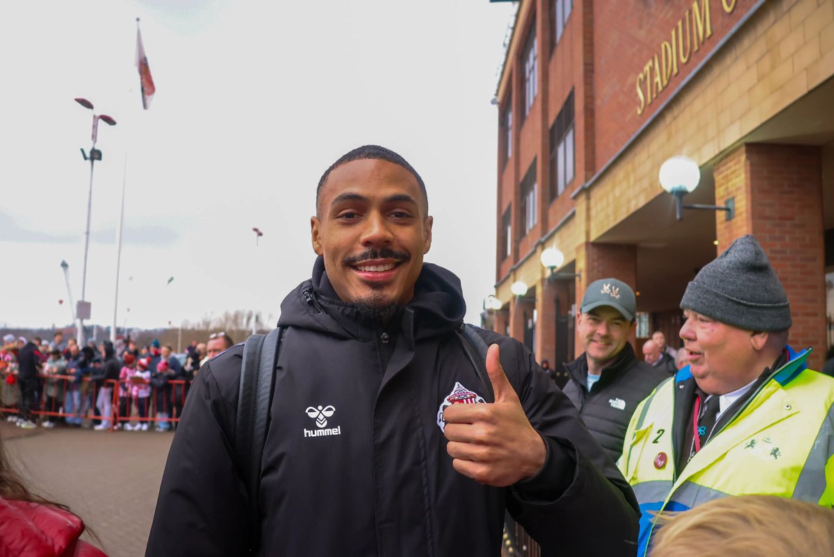 ALS_Fanzine's tweet photo. ISIDOR MAKES MARK
BY BEN THIRKELL

Going into the World Cup with so many players, it was only natural to expect one of the Lads to leave their mark on the tournament. Yes, Granit Xhaka has scored already but Wilson Isidor’s thunder strike last night for Haiti felt like the first real moment from a Mackem at the World Cup. 

It has been a frustrating season for the striker, starting the season looking like he was going to be our main man up top, bagging four in the first nine games. However, the arrival of Brian Brobbey was never with the intention of having him as a back-up and once the goals dried up for Isidor, the Dutchman capitalised. Isidor in fact has not started in the league since a 3-0 defeat to Man City at the Etihad in December. Even when Brobbey suffered an injury in February, Eliezer Mayenda jumped up the pecking order playing ahead of him. 

Isidor certainly had a hard time adapting to the way we played at times, with hold up play far from his strong point and it was very rare that his runs in behind were utilised. Many had already made there mind up that this season would almost certainly be his last at the club, but then came Villa away. He grabbed the equaliser in our rapid turnaround which in very typical Sunderland fashion meant nothing after conceding a late winner anyway. However, it showed that Isidor still had something to offer at this level and it saw a run of promising substitute appearances.

Scoring an important goal away at Everton as well as a good bit of trickery causing Wesley Fofana to be sent off on the final day in the game that helped us secure Europa League football.

It was clear Wilson felt he had a point to prove, and he has done so in the biggest tournament in football with Haiti last night. Sunderland fans already know Isidor is not one for tap ins with a rather brilliant catalogue of goals in Red and White already, but in a game that meant very little yesterday, Isidor showed the world what he is capable of. Rifling one in from the edge of the area as if he had a foot like a traction engine putting it about as top corner as you can get. While everybody was watching the Brazilians dint the Tarton Army’s chances of progression, Wilson made those Mackems who chose to tune in to watch him and possibly Talbi, very happy with their decision.

With Haiti now out, Isidor can enjoy his summer but the question is where will he be come the end of it? With what is undoubtably going to be a busy season on Wearside, with a lot of games to manage, surely we would be silly to let him go?

The way we played in the run-in suited Isidor much more than the largely hold up play reliant stuff that was asked of him earlier in the campaign and it is likely this is the way we want to play going forward.

Brobbey is always going to be first choice should he remain in the North East come the closure of the window in September. I do believe though that you need different types of strikers for different games and with a European campaign coming up I genuinely do believe Isidor could still play a massive part for us. 

Yes, he can be frustrating but he can also produce moments like he did yesterday and for me those sorts of players are not easy to find. On the other hand, Wilson might not want to play second fiddle.

As a big fan of the Haiti international, I would love nothing more than to see him continue at the Stadium of Light and I do believe having Brobbey and Isidor is already two solid options going into next season. With Mayenda already likely on his way out it makes Wilson’s future slightly more promising but it all depends what the club have planned.

In a World Cup that has seen the likes of Lionel Messi, Kylian Mbappe and Erling Haaland flourish, it was certainly nice to see one of our Lads making the headlines and who knows, possibly winning himself the goal of the tournament, we will see.