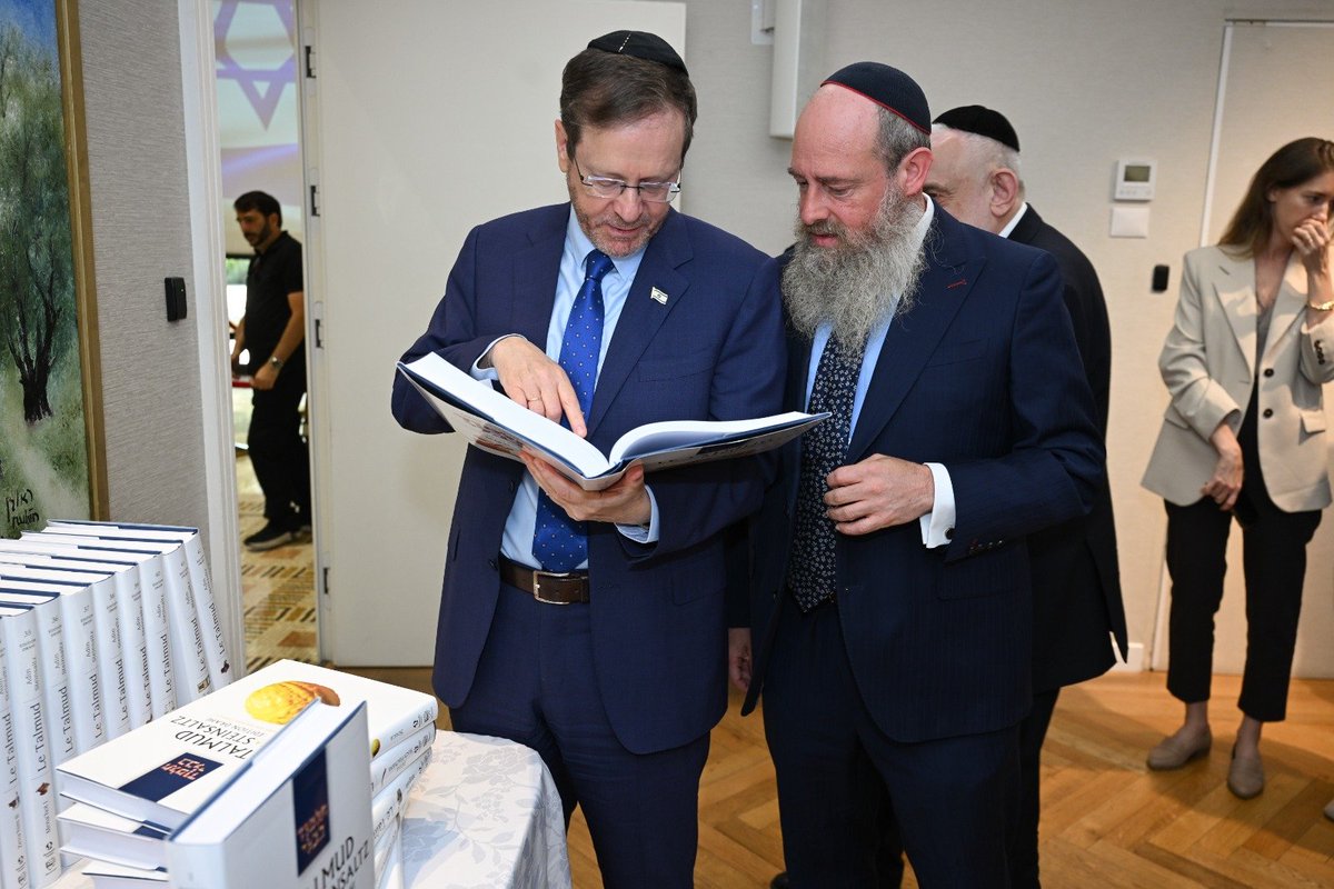 MeniEvenIsrael's tweet photo. 784 years ago, on this very day, the Talmud was burned in Paris.

Today, it returned to speak in French.

At the President’s Residence in Jerusalem, we marked a historic milestone: for the first time in history, the complete Babylonian Talmud has been translated into French.

For me, it was far more than a ceremony.

It was personal.

On 9 Tammuz 1242, twenty-four wagonloads of Talmud manuscripts were burned in Paris. The flames were meant to silence a civilization.

They failed.

Nearly eight centuries later, the Talmud speaks once again in the language of France.

This historic edition was edited, written, and translated by the Steinsaltz Center, published by Biblieurope, and made possible through the generous support of the Patrick & Lina Drahi Foundation.

It continues the lifelong vision of my father, Rabbi Adin Even-Israel Steinsaltz, whose mission was simple and profound:

“Let My People Know.”

After the burning of the Talmud, Rabbi Meir of Rothenburg wrote the elegy Sha’ali Serufah Ba’esh, “Ask, O Thou Burned by Fire.”

Today, I felt history answer:

Ask, you who returned from fire.

Once your parchments were given to the flames in Paris.

Today your scrolls have returned to houses of study.

The fire could not extinguish your voice.

For from your ashes, your letters have returned to speak.

Some moments belong not only to those who witness them, but to history itself.

Today was one of those moments.