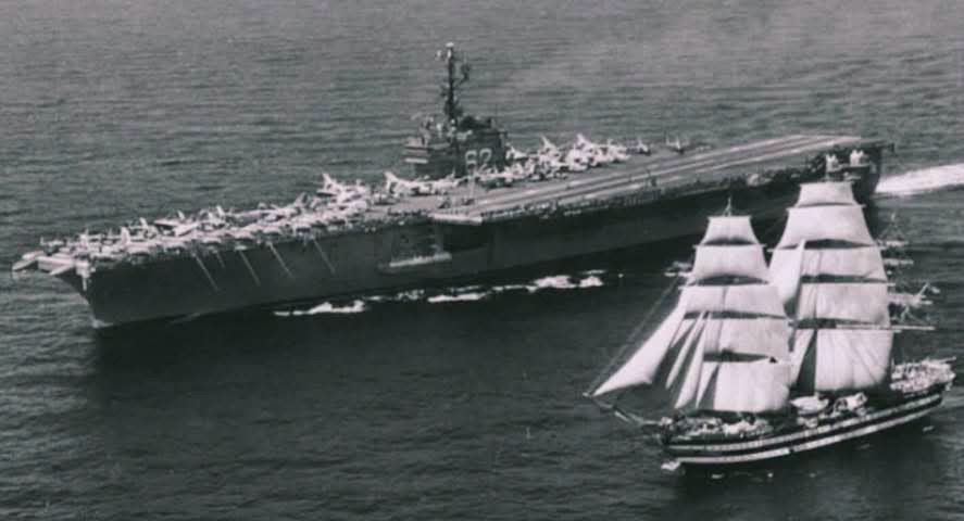 Dr_TheHistories's tweet photo. On 12 July 1962 the American supercarrier USS Independence was steaming through the Mediterranean with the Sixth Fleet when her lookouts spotted a three-masted sailing ship under full canvas, a sight that already belonged to another century. The carrier flashed a signal asking the stranger to identify herself. Back came the reply by light, "Training ship Amerigo Vespucci, Italian Navy." She was a tall ship launched at Castellammare di Stabia near Naples in 1931, her black hull banded with two white stripes in memory of the old gun decks, 26 canvas sails spread across masts more than fifty metres high. The Independence, eighty thousand tonnes of steel and aircraft, took her in and signalled a single line in return, "You are the most beautiful ship in the world."

The compliment outlived the carrier. The Independence was eventually scrapped, but the Vespucci is still sailing, the oldest ship in commission in the Italian Navy, and Italians have called her the most beautiful ship in the world ever since that afternoon. The story did not quite end there either. On 1 September 2022 another American carrier, the USS George H.W. Bush, crossed her path in the Adriatic and sent almost the same words across the water, telling the old ship she was still the most beautiful in the world, sixty years to the season after the first time. Few exchanges between warships are remembered with any fondness.

#drthehistories