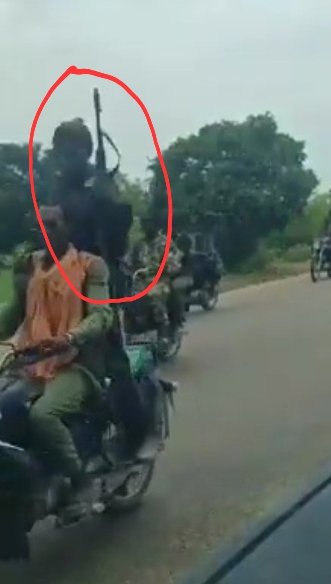 davidkingking_'s tweet photo. The Nigeria Police Force claims that the reported video was misleading. That the heavily armed men on bikes were members of a Vigilante Group and registered hunters. Pls @PoliceNG explain to us:

1. How a vigilante group is allowed to wear an army uniform.

2. Why a vigilante group is carrying heavy machine gvns. Even the police officers can't carry on duty, the policing can't authorize there officers to carry those heavy machines, what's it doing in the hands of vigilance?

3. Why some are masked up and don't have recognized uniforms like all vigilante groups in Nigeria. 

4. Why the people in the video are loud and constituting a nuisance on roads. 

Now since you claim these people are hunters, why are they allowed to posses machine guns that isn't authorized for civilians?