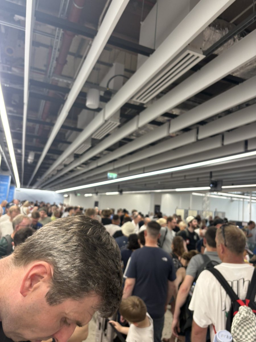 fawnberry73's tweet photo. @bhx_official absolute sh*t show for security. Ended up a bloke shouting flight times out to get them through to their flight. https://t.co/ePfJhol7va
