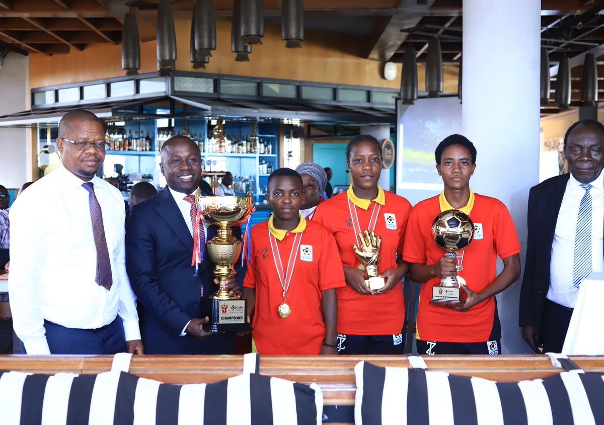 MosesMagogo's tweet photo. Today, together with the State minister of Sports Hon. @OgwangOgwang and some members of the FUFA Executive committee and staff we welcomed the Teen Cranes –The national U17 girls football team at luncheon organized at Fours Points by Sheraton Hotel.
The team successfully defended the CECAFA U17 Women’s Championship in remarkable fashion not only winning the trophy, but emerging champions after playing very good football. They won all their 5 games scoring an impressive 26 goals without conceding any at a tournament held in Dar es salaam.
Our interest is not just about winning trophies at this level but also development and this is just work in progress because at this stage we are inculcating a culture, the spirit of the fighting.
As a federation, we took a decision to provide an opportunity for all national teams for whenever competitions open up. We are not spending money and time for nothing but because we expect these girls in the next few years, to become the stars of the Crested Cranes, the national women senior team.
We are into women's football for a purpose. We want the Crested Cranes to go into the World Cup and to compete. If it is not going to come today, it will come tomorrow. But for us to get there, we must start early. We have decided let us start early by giving the young girls an opportunity when it is still early.
Let us give them the platform and expose them for opportunities in Europe and the rest of Africa. We always remind the girls that when you get an opportunity to go out there, always remember that you are carrying the Uganda flag, that you are carrying the aspirations of this Federation and your country to come back as a better player, to come back as a winner.

A big thank you to the @GovUganda, the parents and relatives, teachers, coaches, schools, partners and sponsors, the media, fans among others that have relentlessly supported women football. The girls’ win is was for us all.