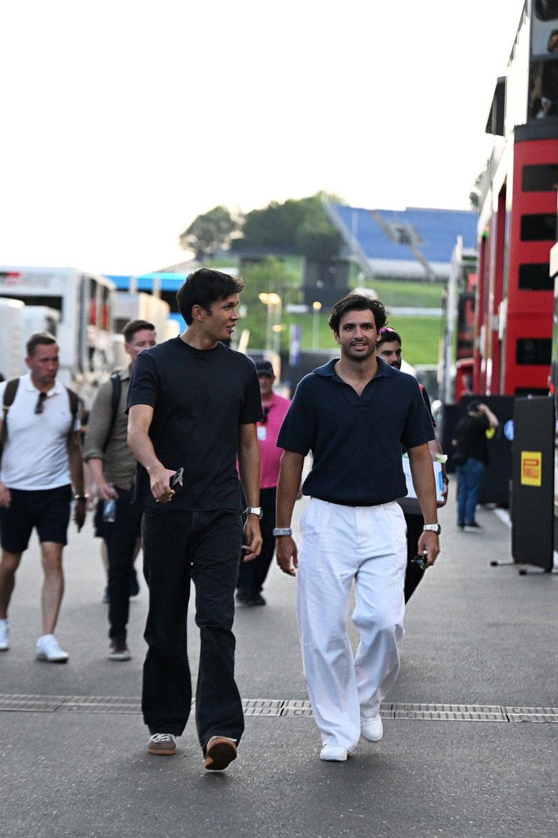teamfifty5's tweet photo. carlos and alex in the paddock 🖤🤍 https://t.co/vVttgam05S