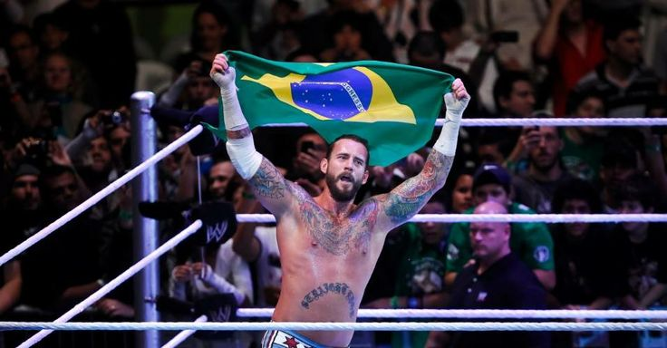 WrestleTalk_TV's tweet photo. CM Punk recalls the incident at a WWE live event in Brazil where he had a machine gun pointed at his face:

"I had machine guns pointed at me. The company went and did a show in Brazil one time, we haven't been back. Brazil I love you, I'd like to come back, lets try to work on that.

"My opponent that night rolled out of the ring and snatched a Brazilian flag from somebody. Brazil don't play. In America, you get people who get bent out of shape, but there's no law against it, burning flags or whatever, freedom of speech.

"He rolled in the ring, I'm down looking at him going 'hmm, maybe no?' I can't remember exactly if he just threw it down and stepped on it, or if he maybe wiped his butt with it, Shawn Michaels did that with the Canadian flag too, and it was palpable, but still different than doing it in Brazil.

"The instant this happened, all of a sudden there's a second referee in the ring, and I'm like 'uh, what's going on?' One referee is talking to him, the other is talking to me, trying to relay the information, then our head of talent relations is in the ring. This all happens lickety-split.

"I'm looking around, then I turn and look, and the ring is surrounded by men in fatigues and one has his gun pointed directly at me. They were offended, and they said, my extra referee and head of talent relations were like 'this match is over, we gotta wrap this up'.

"Homeboy who did the thing was like 'absolutely not, I refuse to do this', so I had to roll him up for real, stack him up, and the ref counted the three. Crowd pops, I grab the flag, jump onto the turnbuckle, I'm kissing the flag 'hey everybody, sorry, I love you'.

"Then I got out of there, and they tried to snatch dude up, grab his passport, and we knew if he handed his passport over, he wasn't coming home. So we, by the cover of night, got him out of there, and we continued on the tour and he went home.

"Very proud people. Legit, I just looked out and this guy was pointing a machine gun at me. Alright."

(The Late Run)