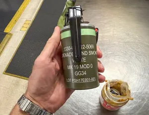 krisvancleave's tweet photo. Just a quick note...hiding a smoke grenade in a jar of peanut butter inside a checked bag did not fool the TSA X-ray machines in Indianapolis.  If anyone needs to hear this--no grenades on planes please.
Images courtesy @TSA https://t.co/i1sgyxWweM