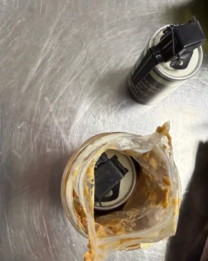 krisvancleave's tweet photo. Just a quick note...hiding a smoke grenade in a jar of peanut butter inside a checked bag did not fool the TSA X-ray machines in Indianapolis.  If anyone needs to hear this--no grenades on planes please.
Images courtesy @TSA https://t.co/i1sgyxWweM
