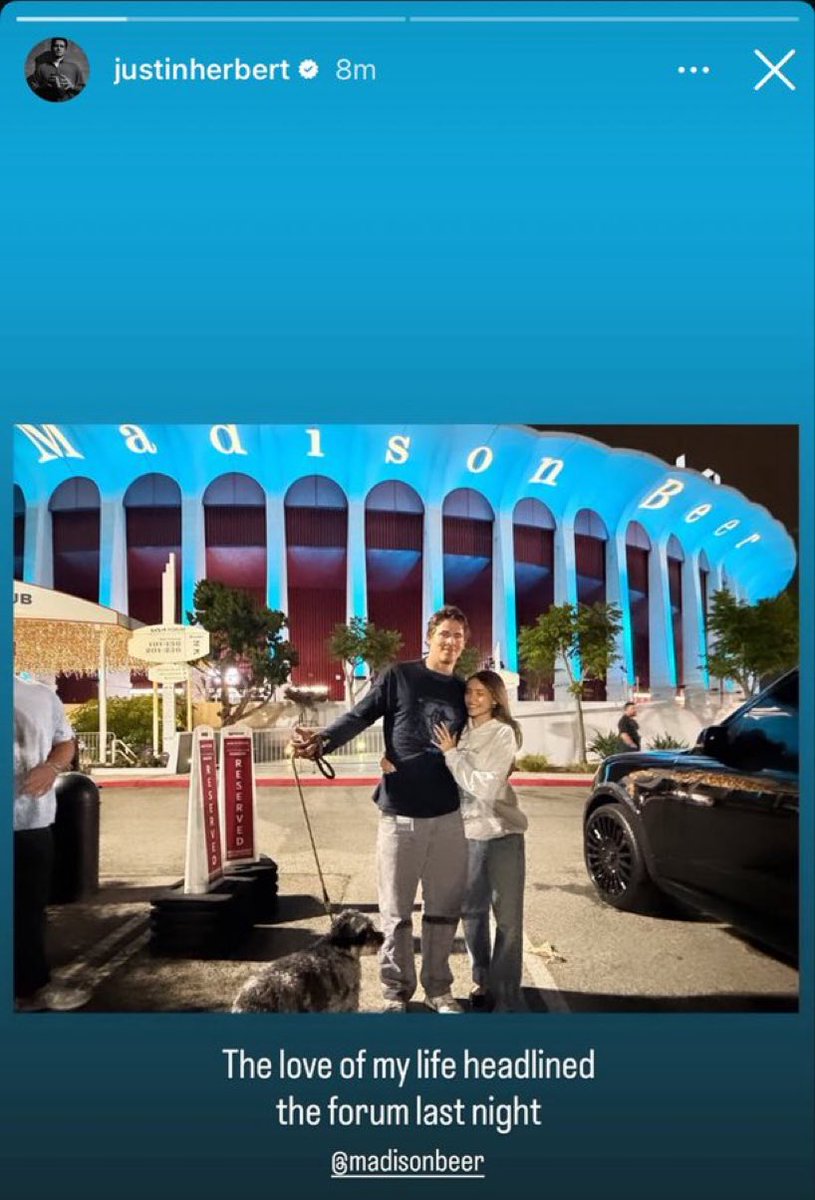 madisojn's tweet photo. He’s at her first kia forum show in her merch, posed with her name lit up in the background, even brought his family and team to her show. Madison you’re deeply loved and deserve nothing less than this and even more https://t.co/7iFEu8ELKY