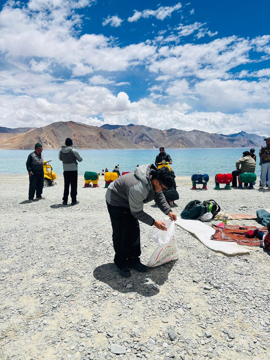 MYBharatHQ's tweet photo. MY Bharat volunteers and participants of the Viksit Vibrant Village Program 2026 – Phase 2 came together for a cleanliness drive near Pangong Tso Lake, reaffirming their commitment to environmental conservation and the vision of a cleaner, greener India.

#MYBharat #VVVP2026 https://t.co/S08VsBzqzA