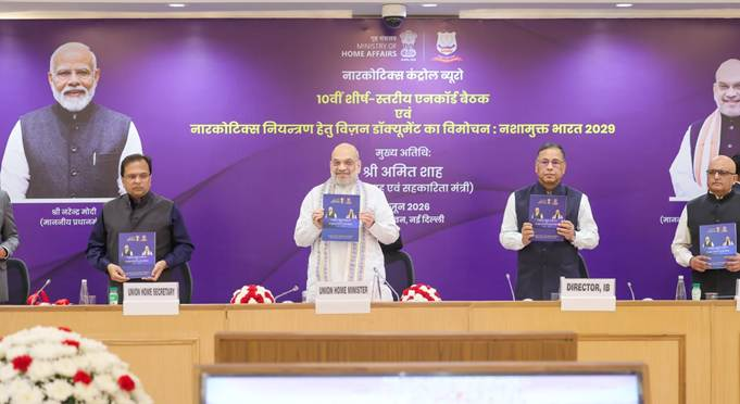 PIB_India's tweet photo. Union Minister @AmitShah chairs 10th Apex Level Meeting of the Narco-Coordination Centre (NCORD) in New Delhi, unveils ‘Vision Document on Drug Control (2026-2029)’

Union Minister also launches the ‘Online Drugs Disposal Fortnight Campaign’, under which a target has been set to destroy more than ₹6,000 crore worth of narcotic substances weighing 2,09,500 kilograms

Read here: https://t.co/hKIUvsDUWX