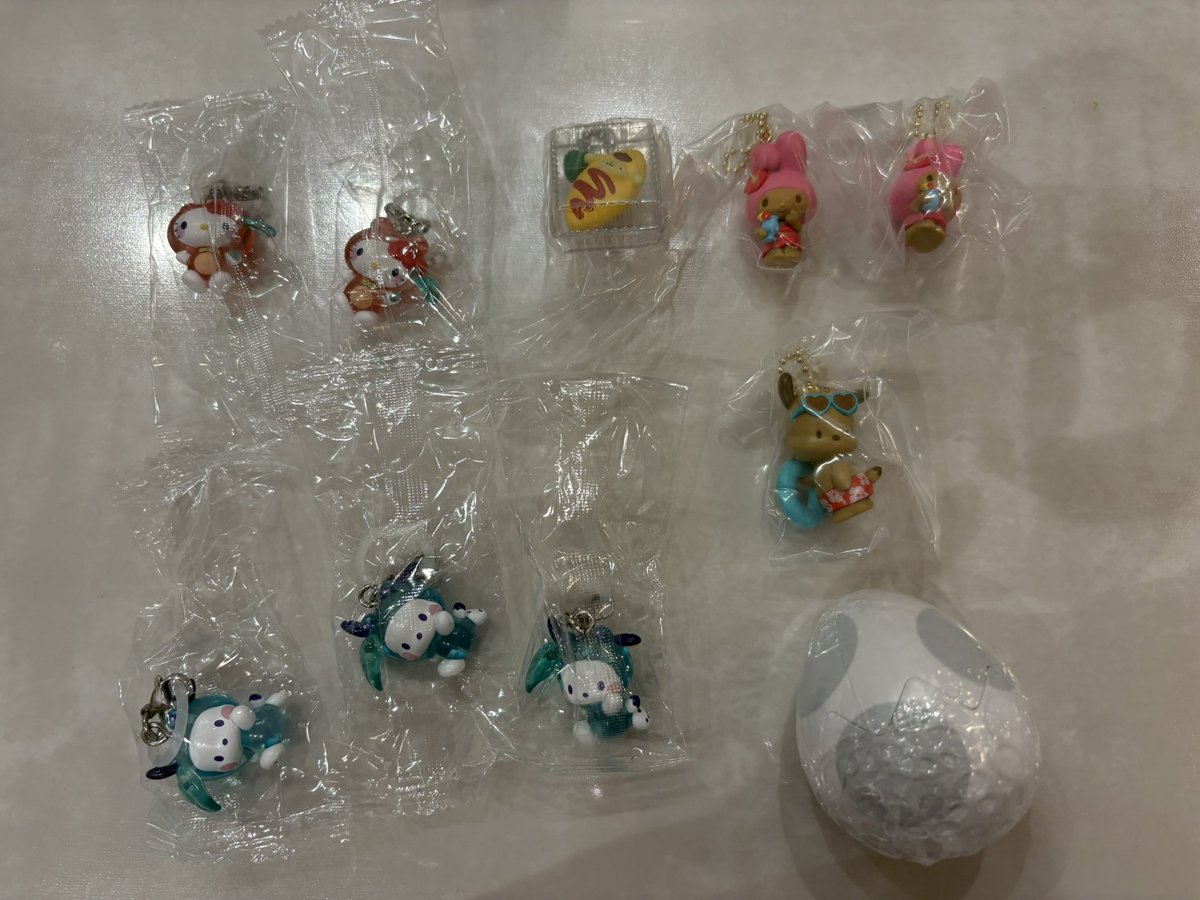 uduki0108's tweet photo. 【交換】めじるしアクセサリー ガチャ サンリオ けろけろパーティ アロハスイングコレクション なりきりお惣菜マスコット

【譲】キティ ポチャッコ マイメロ プリン 白

【求】ヨッシー 緑＞水色、赤、オレンジ、黒

郵送でのお取引希望
検索からもお気軽にお声掛けください https://t.co/JBnIKdeQvV