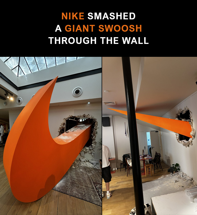 archpng's tweet photo. Nike turned its Swoosh into a full-scale installation in Paris.

A giant orange logo appears to crash through the showroom wall, transforming a simple brand mark into architecture, sculpture, and advertising at once. https://t.co/CiVOaEmG7r