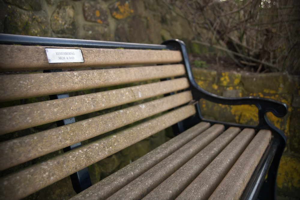 inverclyde's tweet photo. Memorial benches/trees/plaques. To assist staff with maintenance and upkeep of memorial benches/trees/plaques and in line with safety requirements, please do not decorate benches/trees/plaques. Items at memorial sites must be removed before 24 July 2026 https://t.co/Ajz6U8nilN https://t.co/cbNzG2h5Ec