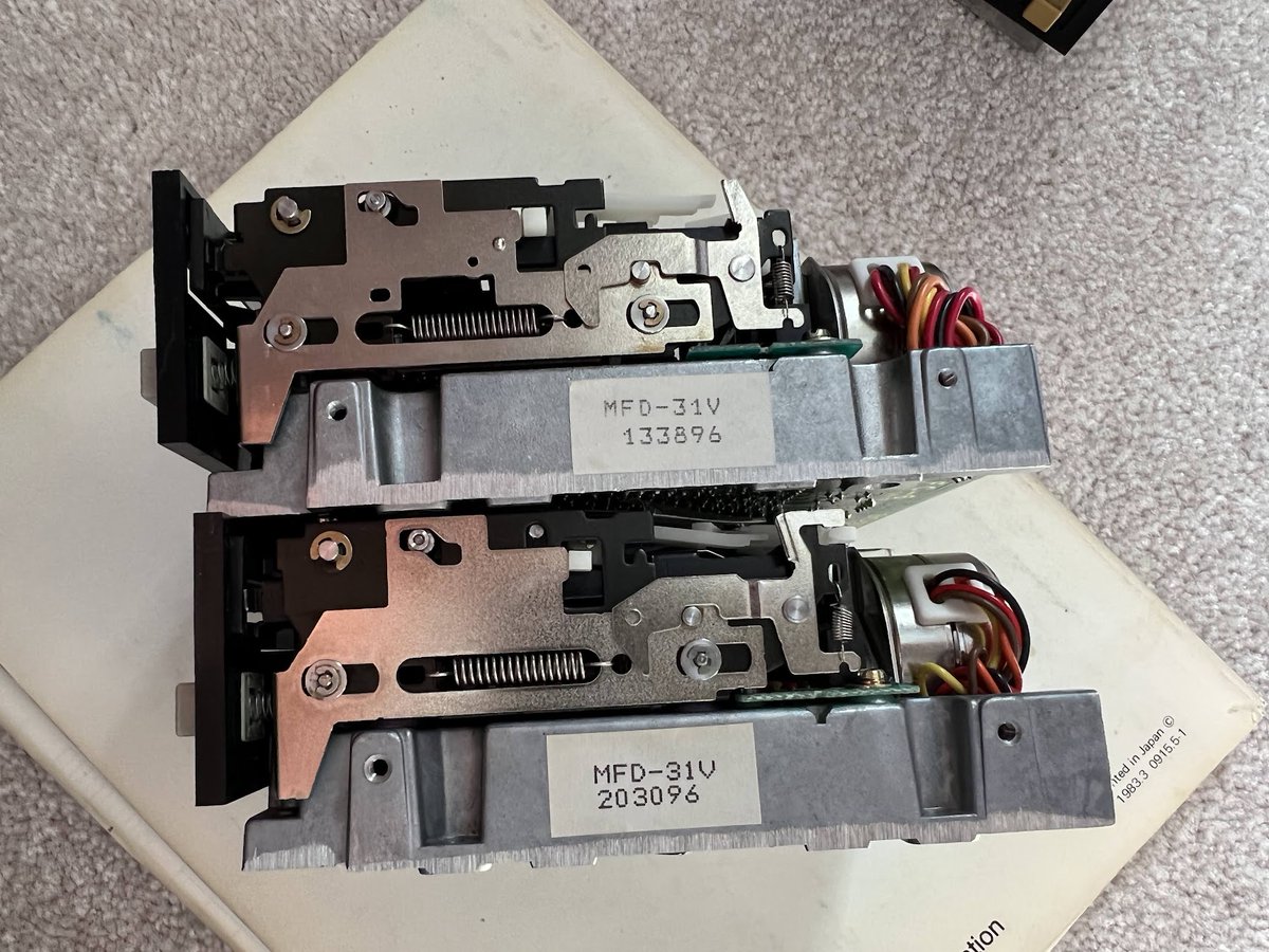 markgm30's tweet photo. @RDKLInc Definitely two drives...the first one is for the OS, and the second one is for storing files.  The white button is integrated into the drive.  The mechanism is likely solidly greased in place (this is what causes people to damage these drives). https://t.co/oOGpNjnsM4