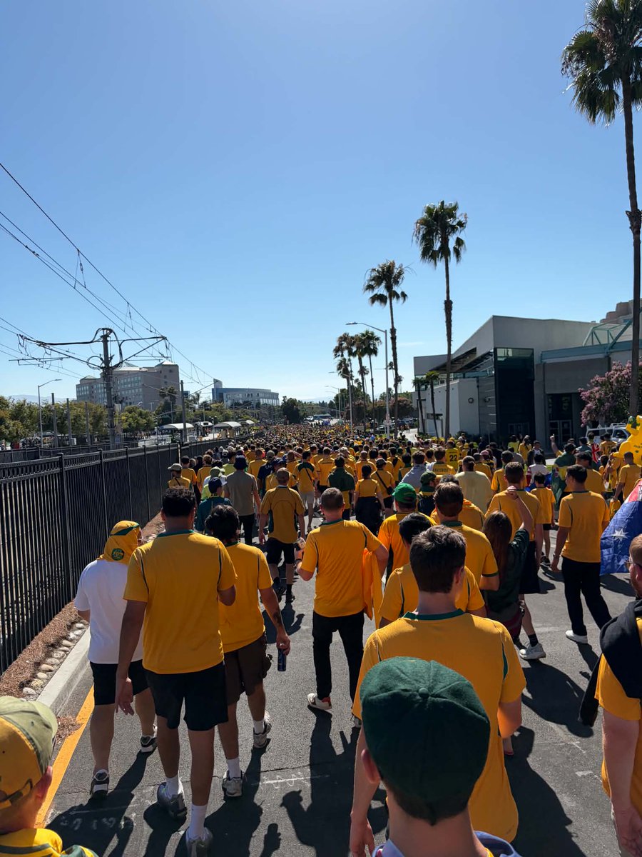 millfieldsports's tweet photo. 🇦🇺 v 🇵🇾 - World Cup Matchday Review (Santa Clara/San Francisco/San Jose/Bay Area) 

I have loved my time here in he Bay Area so far, however,  the overall fan experience left me pretty underwhelmed.

Firstly, the game was marketed as being in "San Francisco." In reality, it was played in Santa Clara, over an hour away by Uber and, from what I experienced, with pretty poor public transport options. If you're a travelling supporter staying in San Francisco, it's a long and expensive trip.

What surprised me most was that there was virtually nothing happening in downtown San Francisco on matchday. No fan festival, no obvious meeting point, no streets full of green and gold or Paraguayan colours. The only organised gathering for Australian fans ended up being... a car park near the stadium so we could march together, no pubs or bars within walking distance.

The stadium itself is genuinely beautiful. One of the nicest I've been to. But it's also in the middle of nowhere, surrounded almost entirely by parking lots. Once you leave the gates, the atmosphere disappears instantly. Compare that to World Cups (or Vancouver/Seattle) where supporters spill into pubs, restaurants and city squares before and after matches, and it just felt like something was missing.

Then there was the crowd.

When the USA took a 2-1 lead over Türkiye, the stadium erupted into loud chants of "USA! USA! USA!" at an Australia vs Paraguay match. 😫

That was bizarre to me.

Maybe it's just a cultural difference, but if I'm wearing my national team's shirt, I'm going to watch my national team. Not someone else's match because there's football on. It felt like there were thousands of locals treating the game as general World Cup entertainment rather than supporters adding to the atmosphere of the fixture they were actually attending.

And that's what I think many Americans don't realise.

The World Cup isn't special because it's hosted in America....

It's special because hundreds of thousands of travelling supporters from around the world bring the culture with them. They're the ones who create the atmosphere that makes a World Cup unforgettable. The host nation's role is to embrace that and make it easy for those supporters to gather and celebrate.

One final kick in the teeth...

One beer, one spirit and two bottles of water came to US$77 (roughly AU$100+). That's hard to justify, even by major sporting event standards.

Would I go again? Absolutely. 😅

The stadium was excellent and seeing the Socceroos at a World Cup is something I'll never forget.

But if this tournament wants to be remembered as one of the greatest World Cups ever, I think the matchday experience outside the 90 minutes still has a long way to go... well in San Francisco anyway. 

We March On 💚💛