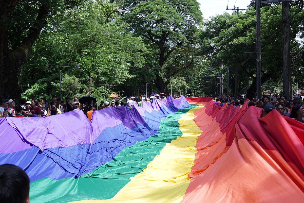 inquirerdotnet's tweet photo. LOOK: A vibrant sea of colors filled the streets as attendees march for love, equality, and safer spaces for all in UP Diliman, Quezon City, on Saturday, June 27. | @ATacsonINQ 

READ MORE: https://t.co/q1Rg2Uig7k

Follow our live updates here: https://t.co/ISLyUVd5iw https://t.co/RjMnGMCUR3