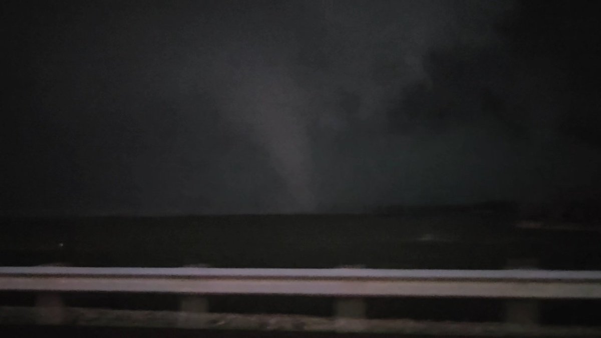 WX_Roo's tweet photo. @JeremyCruzWX 4/13/26 when the Hillsdale, KS EF2 appeared out of nowhere while on the reservoir next to me. The tornado crossed the road a few hundred feet in front of me. Dont think I've puckered up so much https://t.co/jli7RqZ1Pl