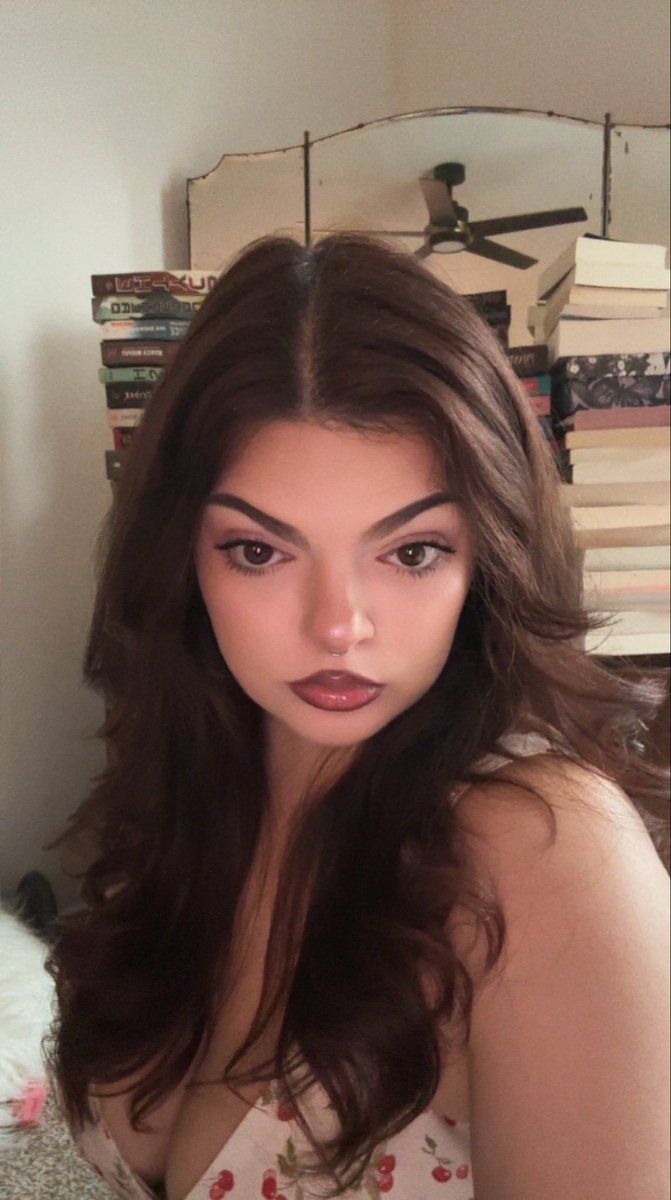 kuhlinuh's tweet photo. me, my big doe eyes and endless tbr against the world https://t.co/XjUy8vUj6W
