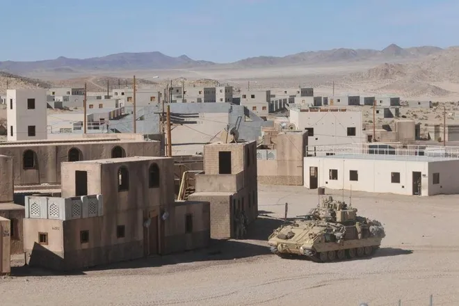 Mark_Lexus's tweet photo. @RedWavePress breaking news !!! the U.S. military has built a fake city to train in and conduct operations against middle east enemies ... who are they going to invade next????

#NationalTrainingCenter #FortIrwin https://t.co/VYulLJGcQs
