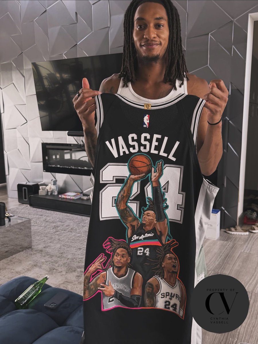 WembyAlienEra's tweet photo. Devin Vassell posing with a custom made Spurs jersey 🔥

#GoSpursGo #PorVida https://t.co/de60F3Fnz4