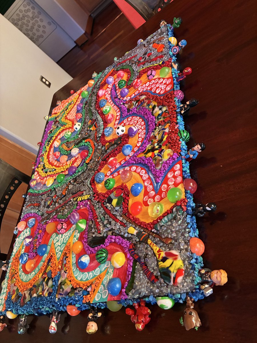 GharrityThomas's tweet photo. Just finished up a new arts &amp; crafts project. Acrylic Paint, Fused Glass, Bouncy Balls, and Mini Superhero Toys on the border on canvas, all held together by a ton of Gorilla Glue. Hope everyone is having a great summer. Have an amazing day!! https://t.co/stlOAkcdnB
