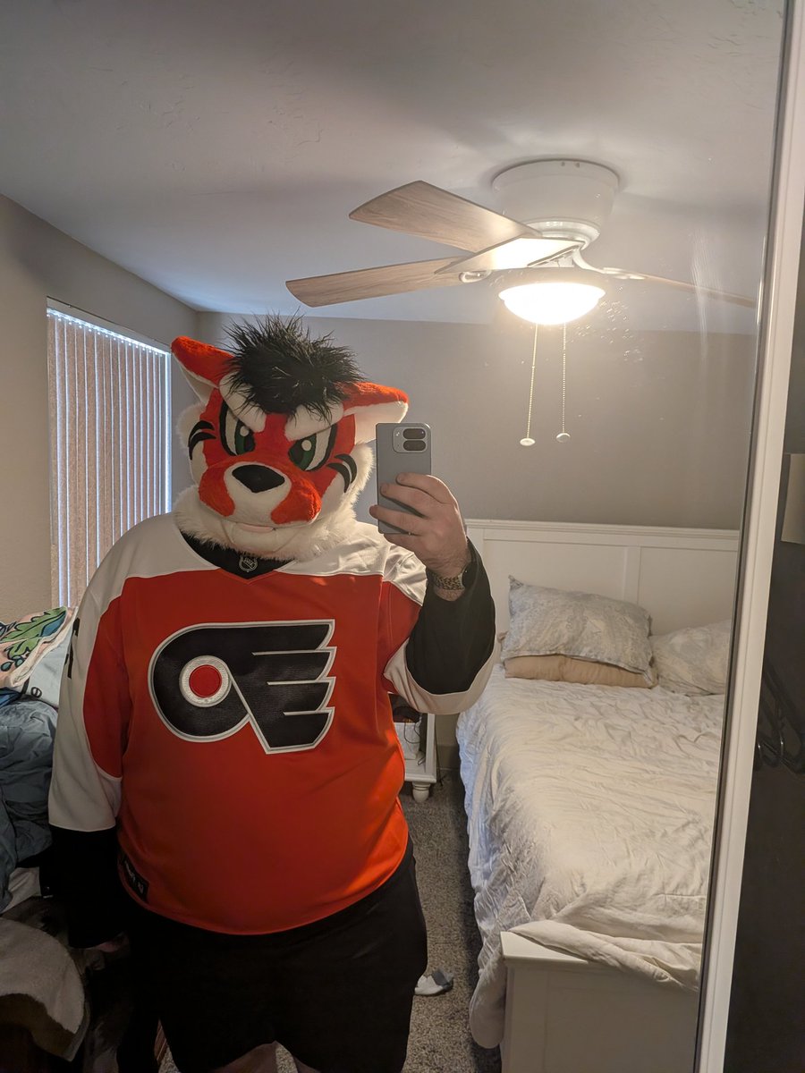 Magnustheorange's tweet photo. A kitty and his jersey #fursuit https://t.co/VVJxq6jWVv