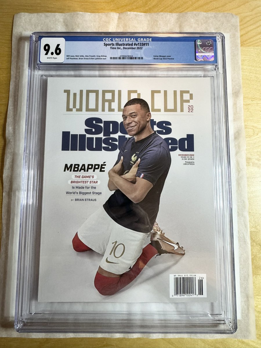 CGC_SI's tweet photo. Mbappe with the goal!  

This is his 1st Sports Illustrated cover from December 2022 during the last World Cup in Qatar.  This is a 1 of 2 variant with the US Men’s team including Christian Pulisic on the other cover.  

Shown graded in newsstand at CGC 9.6. https://t.co/GAUz3V1OYo
