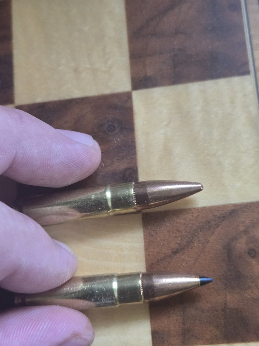 rnr04816's tweet photo. @Crewsader_07 @jakerattlesnk @__JinMi__ I can take a more clear, less blurry photo of some 30 cal ammo right now, with no lighting, on just my cell phone. You can very clearly see the difference between the fmj and the black tip. And yet, the picture above is too blurry to be able to confidently tell lmao https://t.co/G1ZrjdNRAd