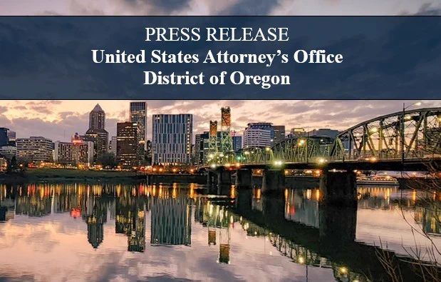 Photograph of a bridge and water with the city of Portland in the background. A banner is displayed on top saying "Press Release United States Attorney's Office, District of Oregon."
