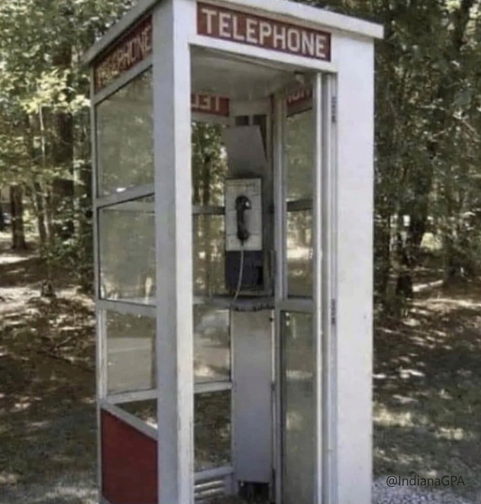IndianaGPA's tweet photo. If you grew up using a phone booth, you’re not just tough, you’re basically a government experiment. We used to cram into a glass box that smelled like cigarettes, Aqua Velva, and poor choices, then grab a receiver that had been passed around like a church collection plate during flu season. If you survived that, your immune system didn’t get strong, it got mean 📞😆