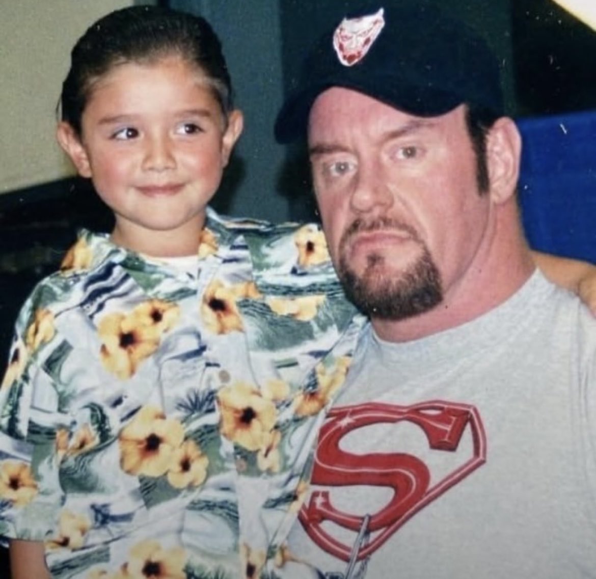 FadeAwayMedia's tweet photo. The Undertaker with a young Dirty Dominik Mysterio 

(2003) https://t.co/Gk5RCz7Mqa