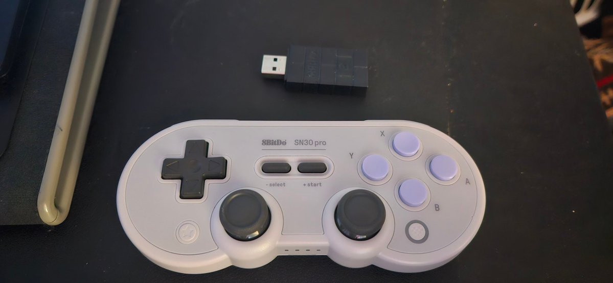 SnuggleVelocity's tweet photo. As much as I want to get the new controllers. My pro 1 is still a strong controller. Especially with how it feels like a snes controller. The second it dies though don't you worry. https://t.co/TXIq57FMnA
