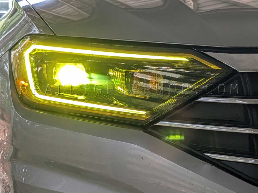HeadlightArmor's tweet photo. Volkswagen Jetta SEL getting ready to light the night yellow with Headlight Armor GT Yellow Headlight Protection Film applied. Protection with a splash of color. Are your lights protected? https://t.co/wKiNUKIeg8