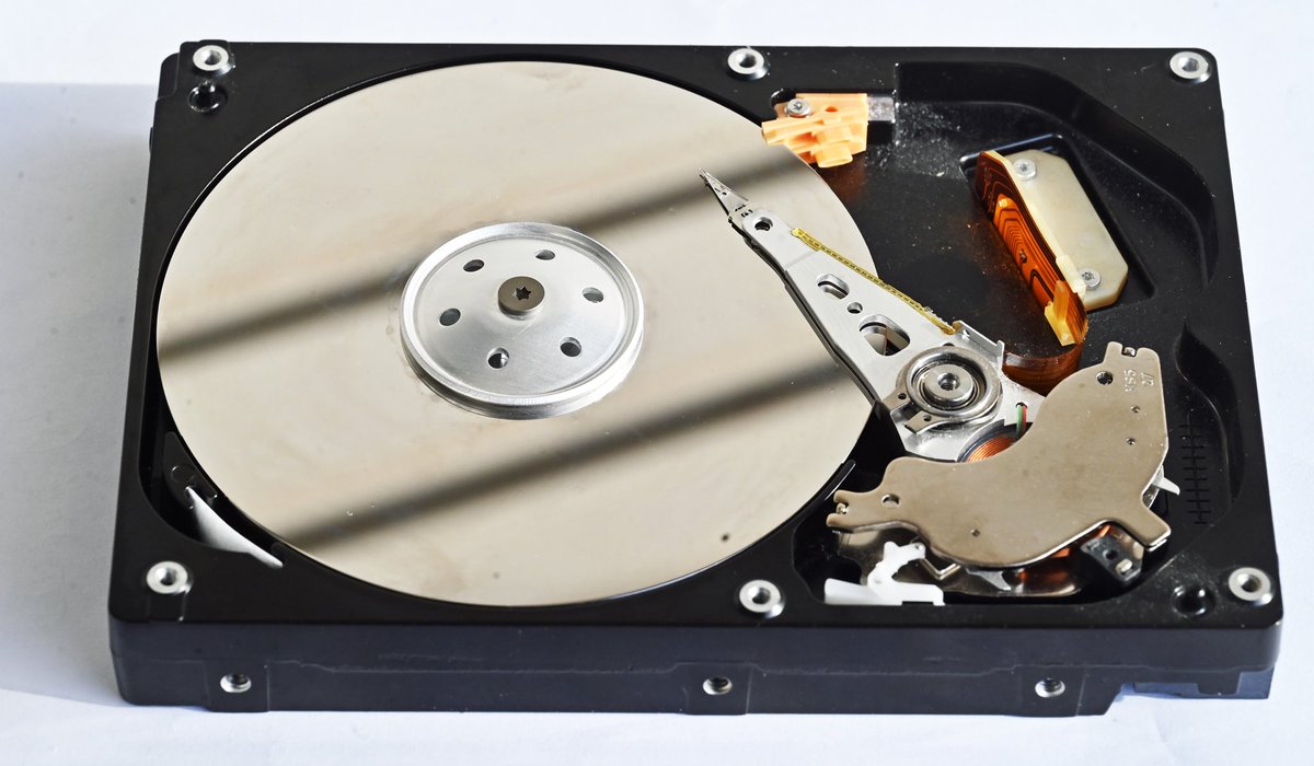 BrianRoemmele's tweet photo. THEY WEIGHED A HARD DRIVE AND FOUND OUT DATA HAS MASS!

And if we continue to make more data it will weigh more than the Moon!

—

What if the vast majority of the universe’s mass the mysterious “dark matter” that binds galaxies together without emitting or absorbing light is not some exotic particle, but the accumulated physical weight of information itself? 

This is the startling implication of a theory grounded in thermodynamics, information science, and a bold reinterpretation of what “reality” fundamentally is.

The Thermodynamic Weight of Bits

The foundation begins with a principle established decades ago. In 1961, physicist Rolf Landauer demonstrated that information is not abstract or massless. Erasing one bit of information requires a minimum amount of energy, given by the formula:

[ kT \ln 2 ]

where (k) is Boltzmann’s constant and (T) is the temperature. This tiny but real energy cost has been experimentally verified. Because energy and mass are equivalent ((E = mc^2)), information necessarily possesses a minuscule but non-zero mass.

Claude Shannon’s information theory complements this by quantifying information through entropy the measure of uncertainty or disorder in a message or system. 

A blank hard drive (all zeros or all ones) has low entropy and, by extension, lower informational “mass.” 

A drive filled with random, meaningful data has high entropy. When data is written or erased, real physical changes occur in the medium.

Extrapolating current global data growth rates (often cited around 25% annually in popular analyses), the cumulative mass of all stored human information could, in a few centuries, reach scales comparable to astronomical bodies. 

While individual bits contribute negligibly, the sheer volume across the cosmos becomes significant.

Dark Matter as the Universe’s Data Cloud

Physicist Melvin Vopson has formalized these insights into the mass-energy-information equivalence principle. In his 2019 paper in AIP Advances, Vopson proposes that information is not merely carried by matter it is a form of matter with measurable mass.

This leads to a radical possibility: the invisible mass dominating galactic dynamics and cosmic structure dark matter could be the gravitational signature of vast quantities of information encoded at the most fundamental level. These informational “bits” would be electromagnetically dark (interacting primarily through gravity), chargeless, and spinless in their effective behavior, matching key properties sought in dark matter candidates.

Vopson’s estimates suggest that on the order of (10^{93}) bits of information could account for the observed dark matter density. Recent discussions have even linked this to simulation hypotheses: if the universe runs on informational substrates, the “missing” mass is simply the overhead of the computation itself.

Consciousness as the Interface

Here the theory takes a profound turn. If the underlying fabric of reality is a computational cloud of ones and zeros energetically and gravitationally real but invisible to electromagnetic senses then something must interpret it into the coherent, meaningful world we experience.

Consider a hard drive: the data sits as magnetic domains or charge states, undetectable to the naked eye and meaningless without context. 

Only when processed and rendered through a screen, processor, and software does it become images, text, or simulations we can navigate. The storage medium holds the raw information; the interface gives it meaning and form.

Applied to cosmology and mind, consciousness may function analogously. It serves as the rendering layer the “display” and interpretive engine that decodes the informational substrate (potentially the dark matter field itself) into the rich, participatory reality of space, time, objects, and self. Without this interface, the universe remains a vast, silent ledger of bits. 

1 of 2