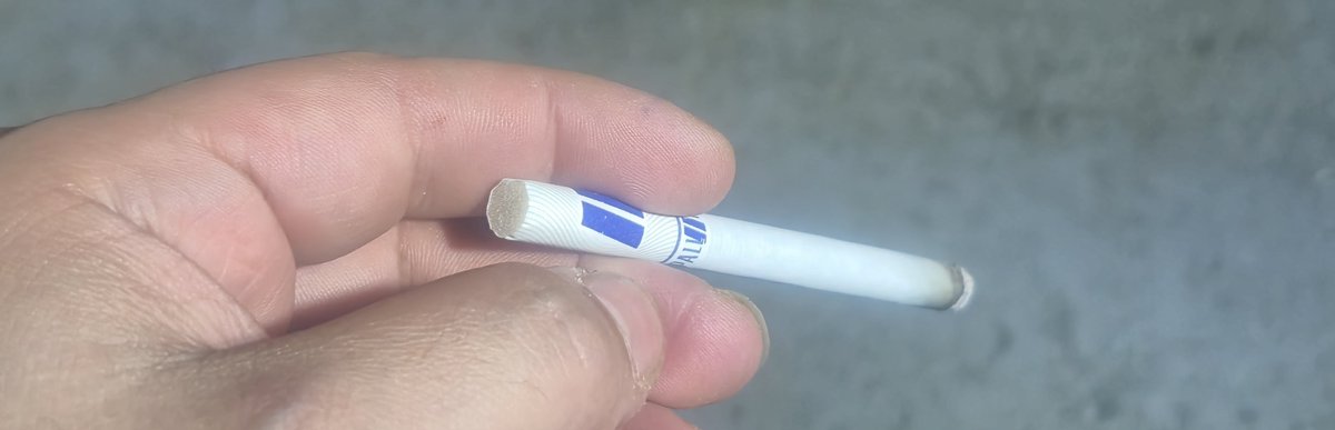 one last cigarette The Stock Photo - Download Image Now - Quitting Smoking, Addiction, Business Finance and Industry Box of cigarettes, one cigarette,