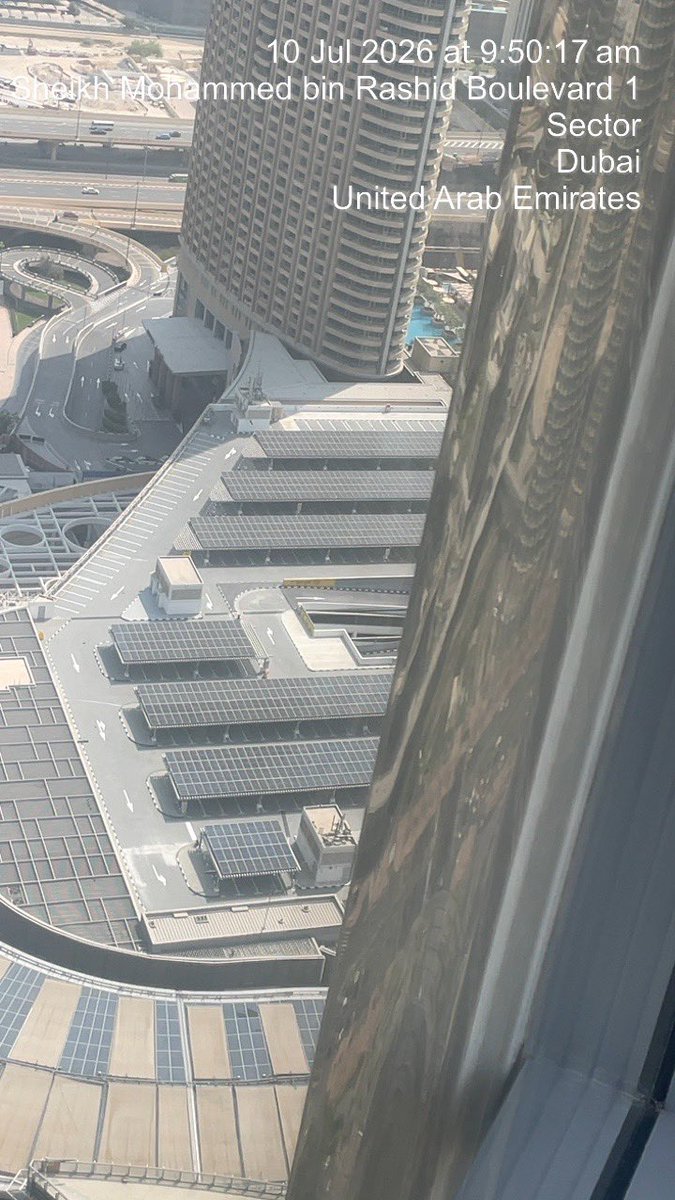 Xthercares's tweet photo. @_Nsznn Dubai has 24/7 electricity, this is the famous Dubai Mall roof top, plastered with solar panels, I just took this picture as I’m in far up above it. https://t.co/POcDUabXKJ