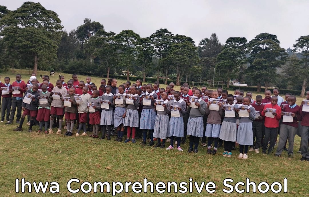 Storymoja's tweet photo. See we told you reading is cool , and there is you that won't lift a book. 
Anyway, Ihwa Comprehensive learners are wondering how you can build a nation if you won't read.
#nationalreadaloud2026 #worldrecordedition #1millionreaders #kenyareads https://t.co/7596Q0ExHK