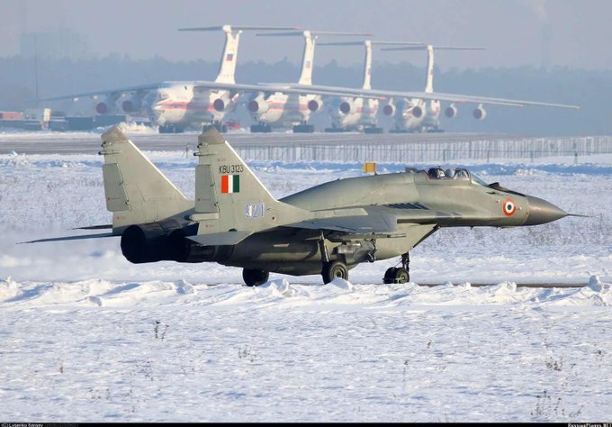 TargetMiss4641's tweet photo. IAF mig-29 upg "BAAZ" somewhere in russia-  
Can you guess the aircraft in background? https://t.co/OYoQNm4XAn