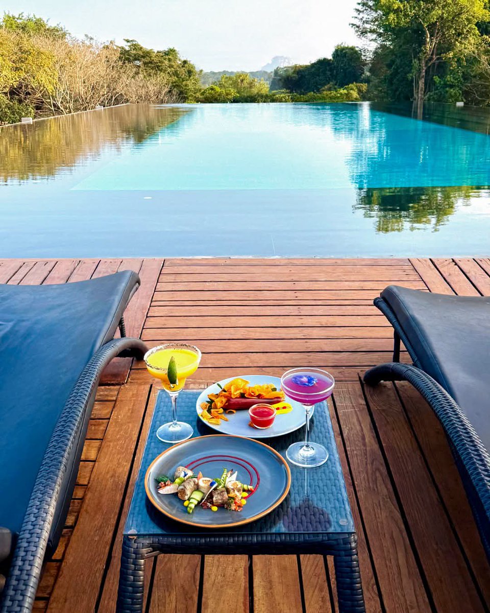 HotelExpress_lk's tweet photo. The best seat in Sigiriya isn't on the rock—it's by the infinity pool. 
Unwind at Aliya Resort &amp; Spa with handcrafted cocktails, delicious bites, and breathtaking views of the iconic Sigiriya Rock. Every sunset feels unforgettable.
📍Sigiriya, Sri Lanka 🇱🇰
#AliyaResort #Sigiriya https://t.co/sQ7PfkB6w6