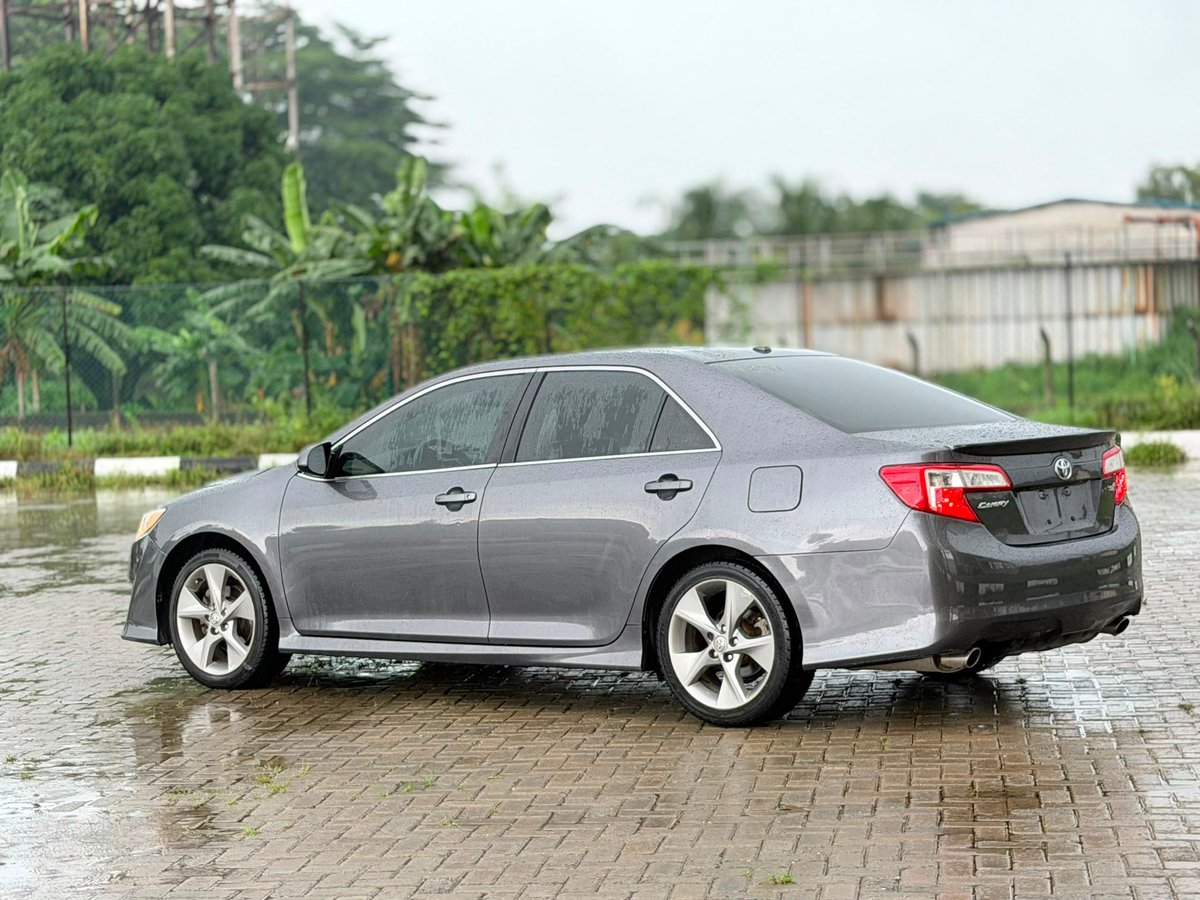 Ghostvariables's tweet photo. 🚘DIRECT TOKS🚘
                  🚨
Behold, a direct vessel from the distant lands of the Americas 🇺🇸! Untouched by the wrath of collision, wholly unblemished and free of affliction.

The Lineage of the Vessel:
 Name: Toyota Camry Sport, of the mighty tribe of SE V6.

 Genesis (year) : Forged in the year of our LAWD 2014.

 The Crossing Delivered past the guards of Customs in the seventh month of this very year, 2026 🛃.

The Blessings Contained Therein:

 * Thou shalt need no iron key, for by the press of thy thumb shall its heart awaken 👍
 * It possesseth unseen guides to lead thee safely into thy parking space ✅
 * Its flesh is as it was in the beginning; a first body of perfect form.
 * Clothed in raiments of pure white without, and skins of deep black within.
 * Fashioned with seats that stretch forth to cradle thy thighs upon the journey.
 * Its breath is pure, for the catalysts and sensors of the air remain whole and unplucked.
 * The music thereof is like unto a heavenly choir, boasting the premium sounds of Mark Levinson.

💰 The Tribute Required:
Bring forth 16 Million naira Let no man speak of bargaining, for the decree is firm! 📌

📍 Where Thou Shalt Find It:
Seek ye this chariot on the path of Lasu Igando, near the resting place of Ipaye, even directly across from the great market known unto men as Twins Faja 🏟️.