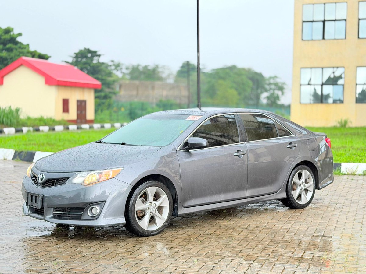 Ghostvariables's tweet photo. 🚘DIRECT TOKS🚘
                  🚨
Behold, a direct vessel from the distant lands of the Americas 🇺🇸! Untouched by the wrath of collision, wholly unblemished and free of affliction.

The Lineage of the Vessel:
 Name: Toyota Camry Sport, of the mighty tribe of SE V6.

 Genesis (year) : Forged in the year of our LAWD 2014.

 The Crossing Delivered past the guards of Customs in the seventh month of this very year, 2026 🛃.

The Blessings Contained Therein:

 * Thou shalt need no iron key, for by the press of thy thumb shall its heart awaken 👍
 * It possesseth unseen guides to lead thee safely into thy parking space ✅
 * Its flesh is as it was in the beginning; a first body of perfect form.
 * Clothed in raiments of pure white without, and skins of deep black within.
 * Fashioned with seats that stretch forth to cradle thy thighs upon the journey.
 * Its breath is pure, for the catalysts and sensors of the air remain whole and unplucked.
 * The music thereof is like unto a heavenly choir, boasting the premium sounds of Mark Levinson.

💰 The Tribute Required:
Bring forth 16 Million naira Let no man speak of bargaining, for the decree is firm! 📌

📍 Where Thou Shalt Find It:
Seek ye this chariot on the path of Lasu Igando, near the resting place of Ipaye, even directly across from the great market known unto men as Twins Faja 🏟️.