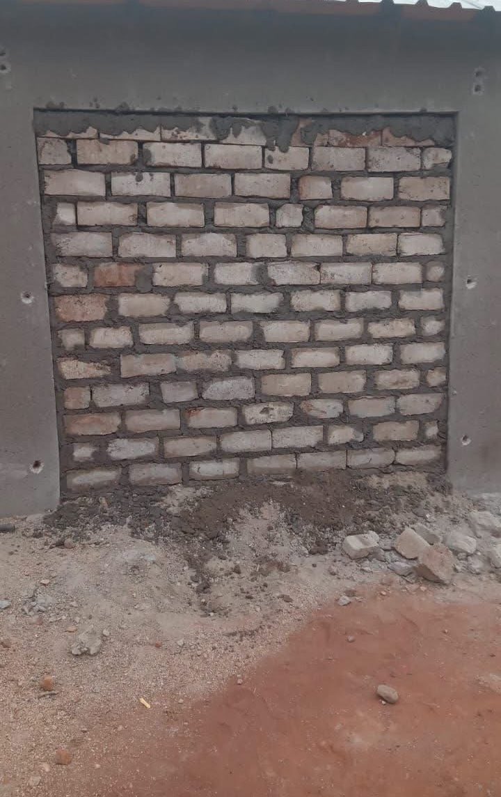 GershomSA's tweet photo. The community decided to build a wall at the entrance of the spaza shop owned by an illegal foreign national after he refused to leave, https://t.co/03szk6OddA